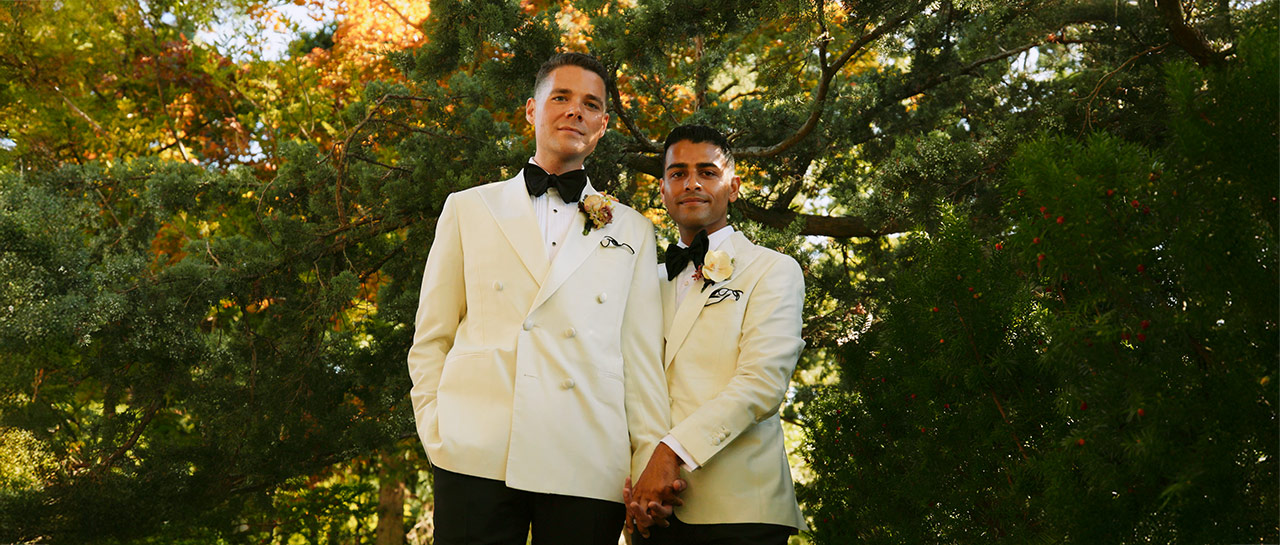 Matt and Sam in the Graydon Hall Manor gardens on their wedding day