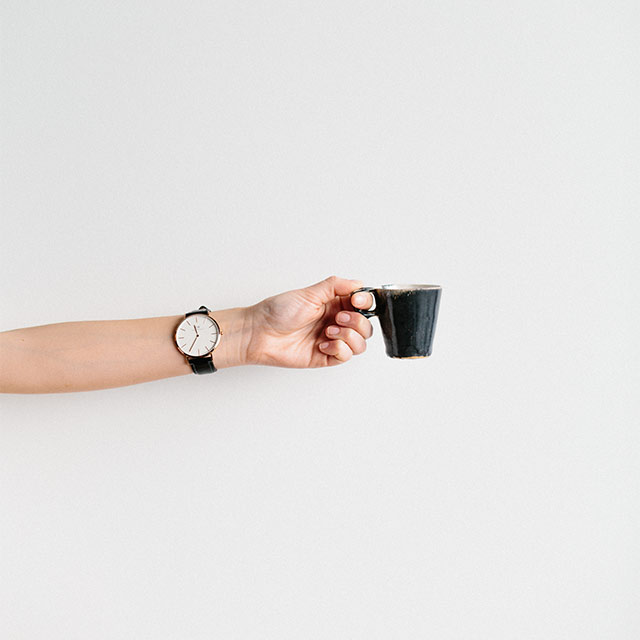Espresso mug against white wall